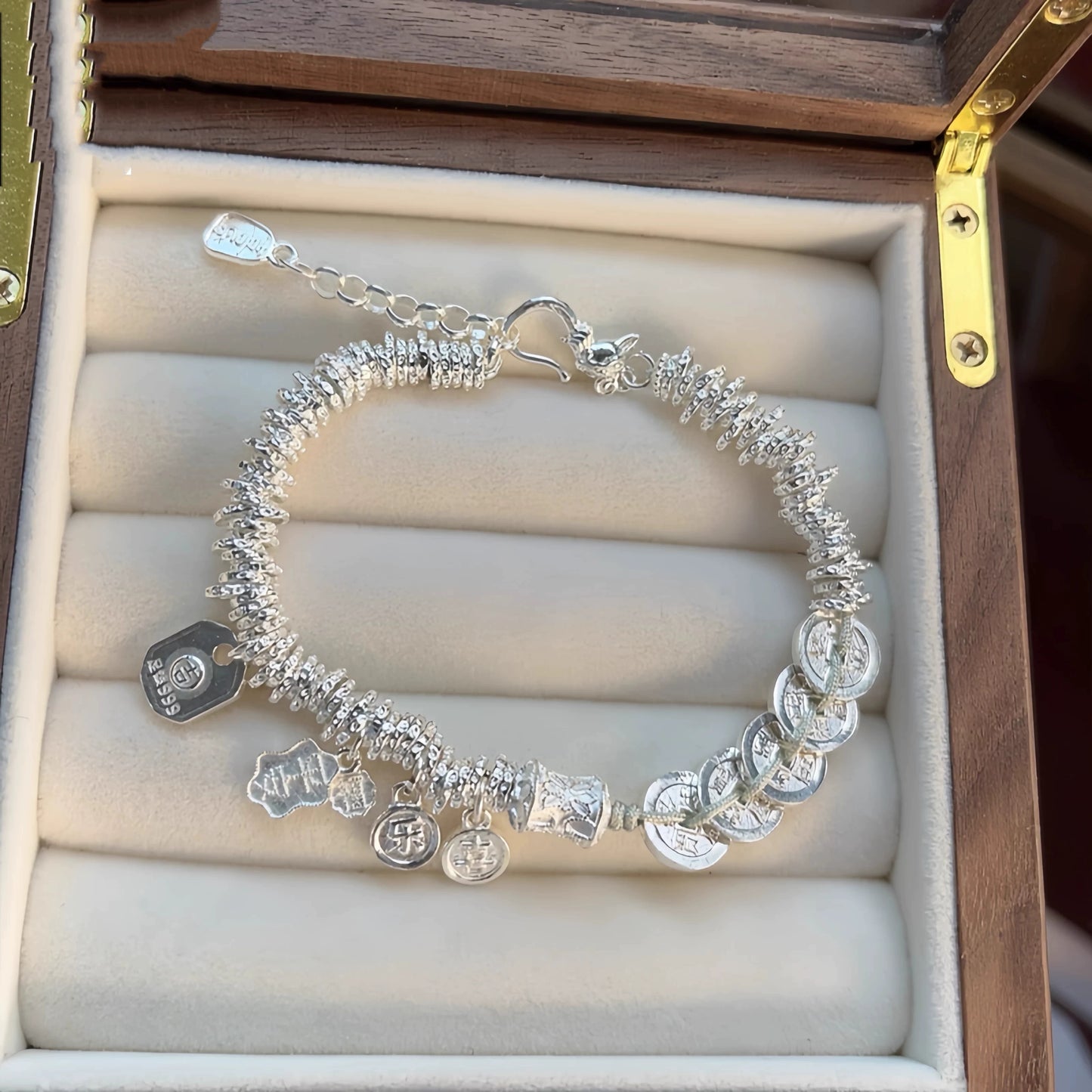 AuraKin Coiled Butterfly Silver Bracelet