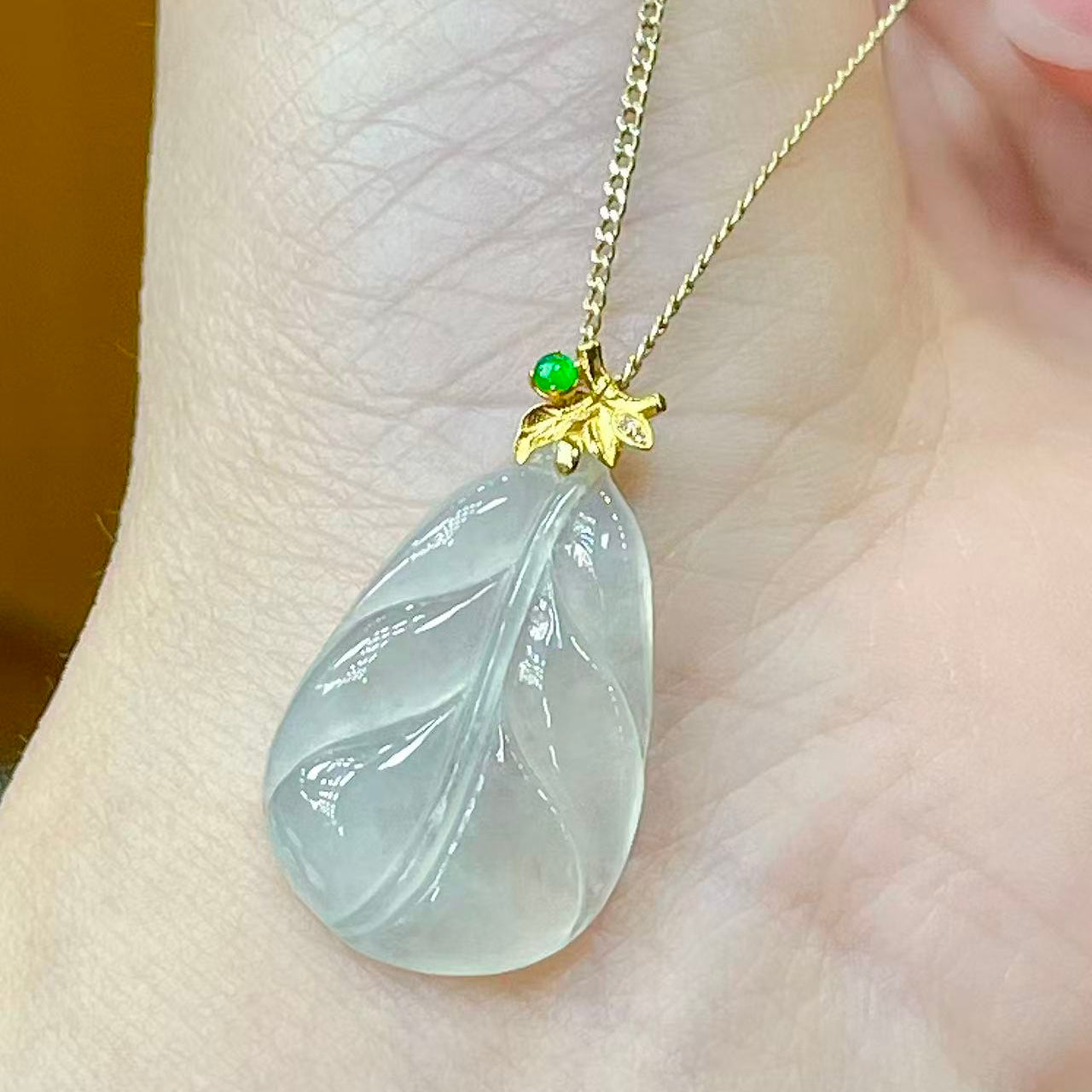 Natural High-Ice Jade Leaf Pendant, Translucent with Fluorescent Glow, Plump Smooth Shape, 18K Gold Branch & Leaf Setting Symbolizes Noble Status, Successful Career & Prosperous Family