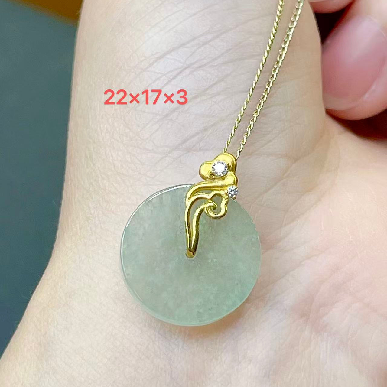 Ice-type jade Ping An Kou with snowflake inclusions  18K gold with auspicious cloud design, symbolizing peace and smooth life