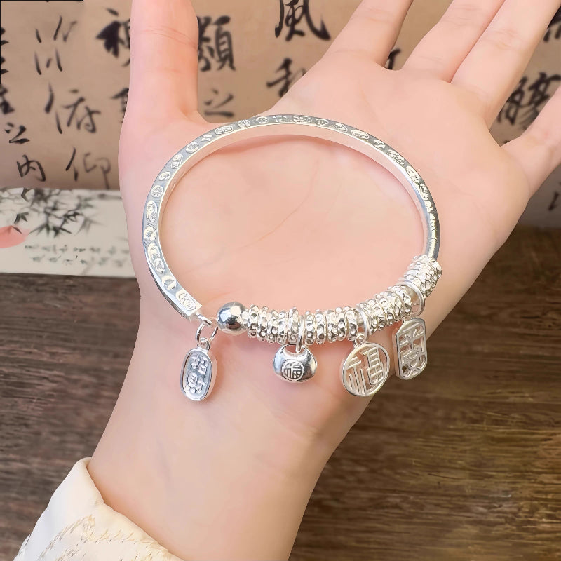 AuraKin Coiled Butterfly Silver Bracelet