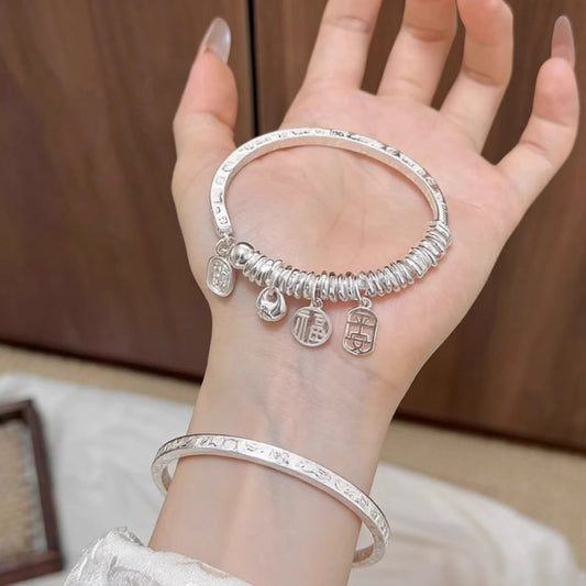 AuraKin Coiled Butterfly Silver Bracelet
