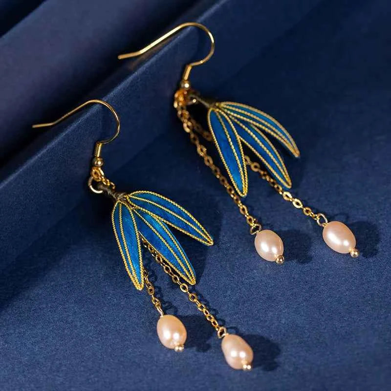 Original intangible cultural heritage velvet petals s925 Tremella hook ancient Hanfu cheongsam new Chinese earrings temperament light luxury