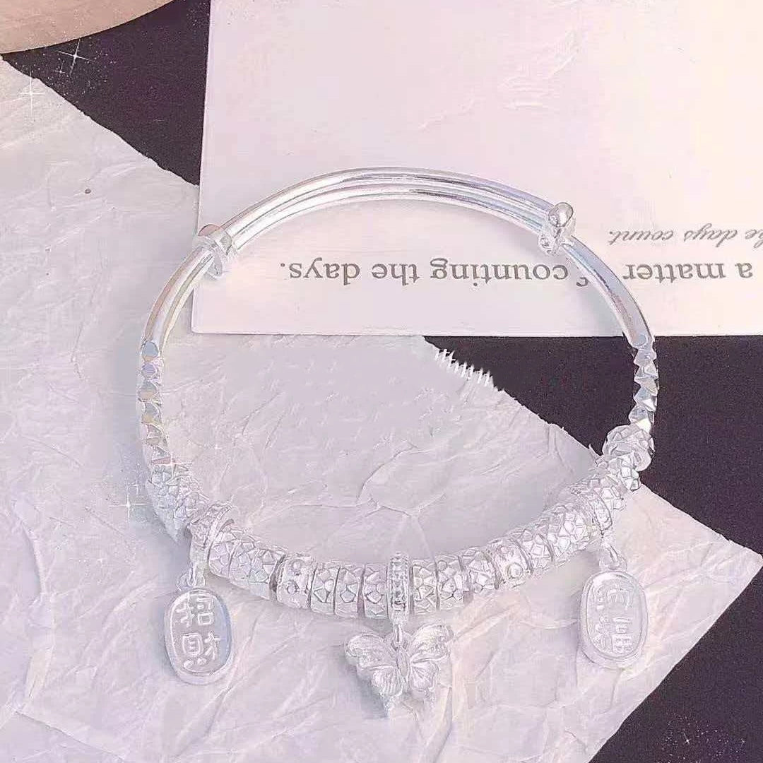 AuraKin Coiled Butterfly Silver Bracelet