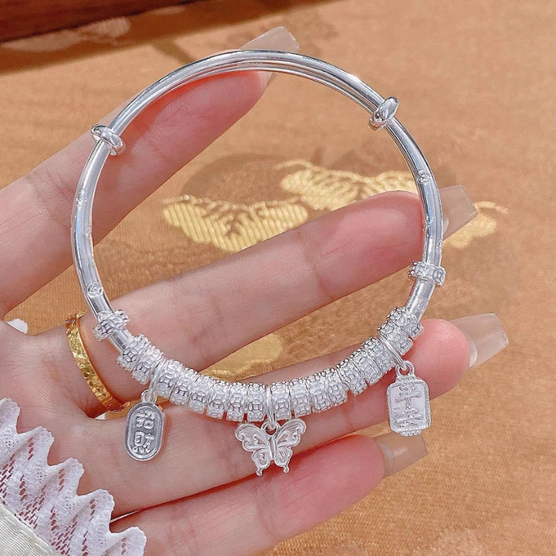 AuraKin Coiled Butterfly Silver Bracelet