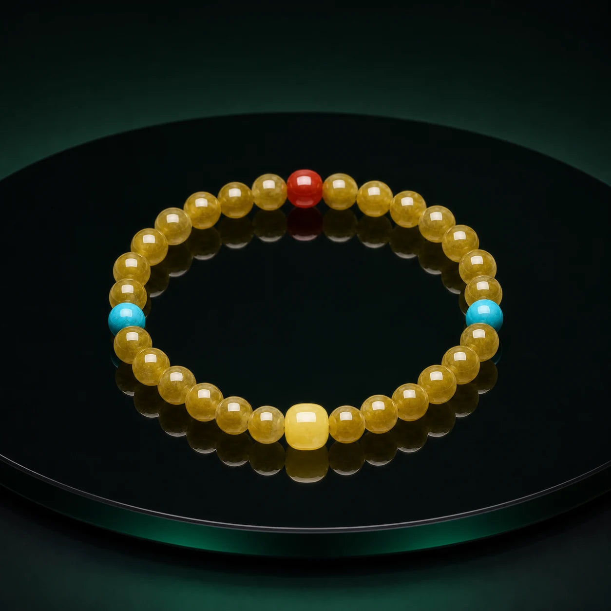 Celadon bead bracelet on an obsidian mirror